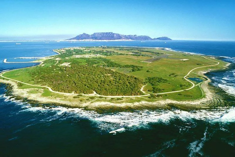 Aerial view of Robben Island surrounded by the Atlantic Ocean.
