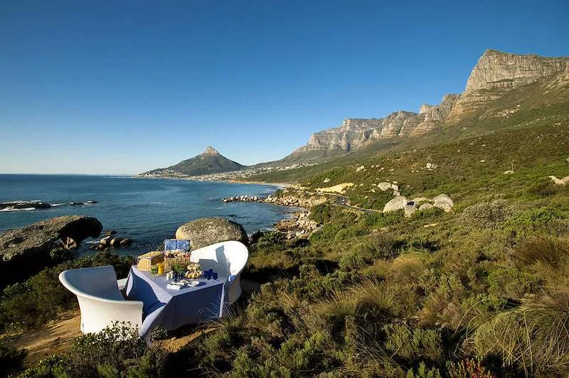 A seaside terrace at the Twelve Apostles looks out toward the Atlantic and coastal mountains.