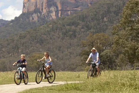 Cyclists follow a rocky trail through the Blue Mountains.