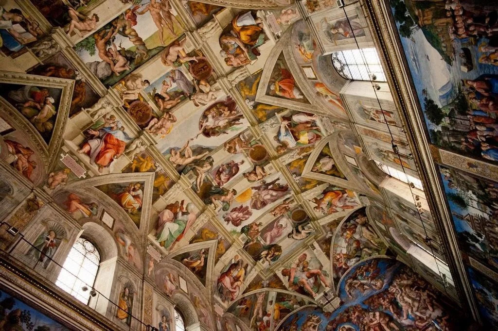 Painted panels covering the vaulted ceiling of the Sistine Chapel.